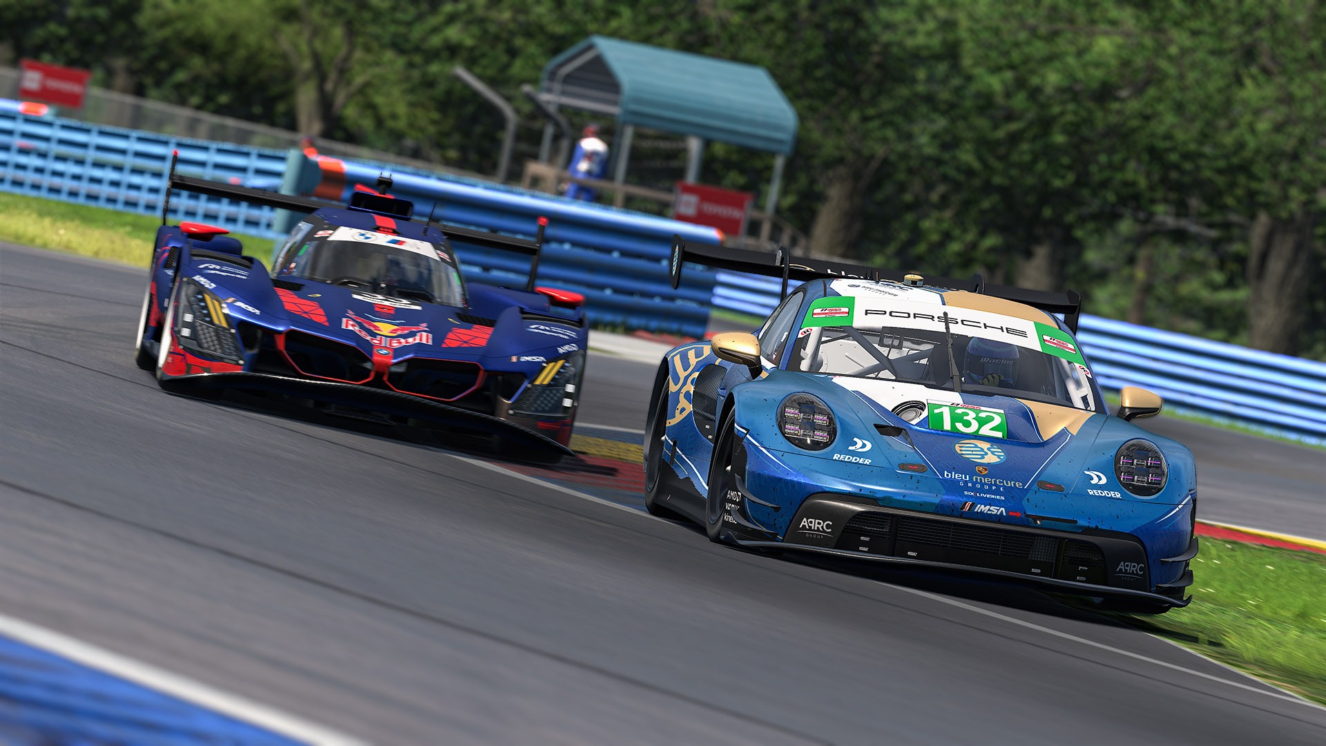 A GTP prototype and the #132 Porsche racing at Watkins Glen