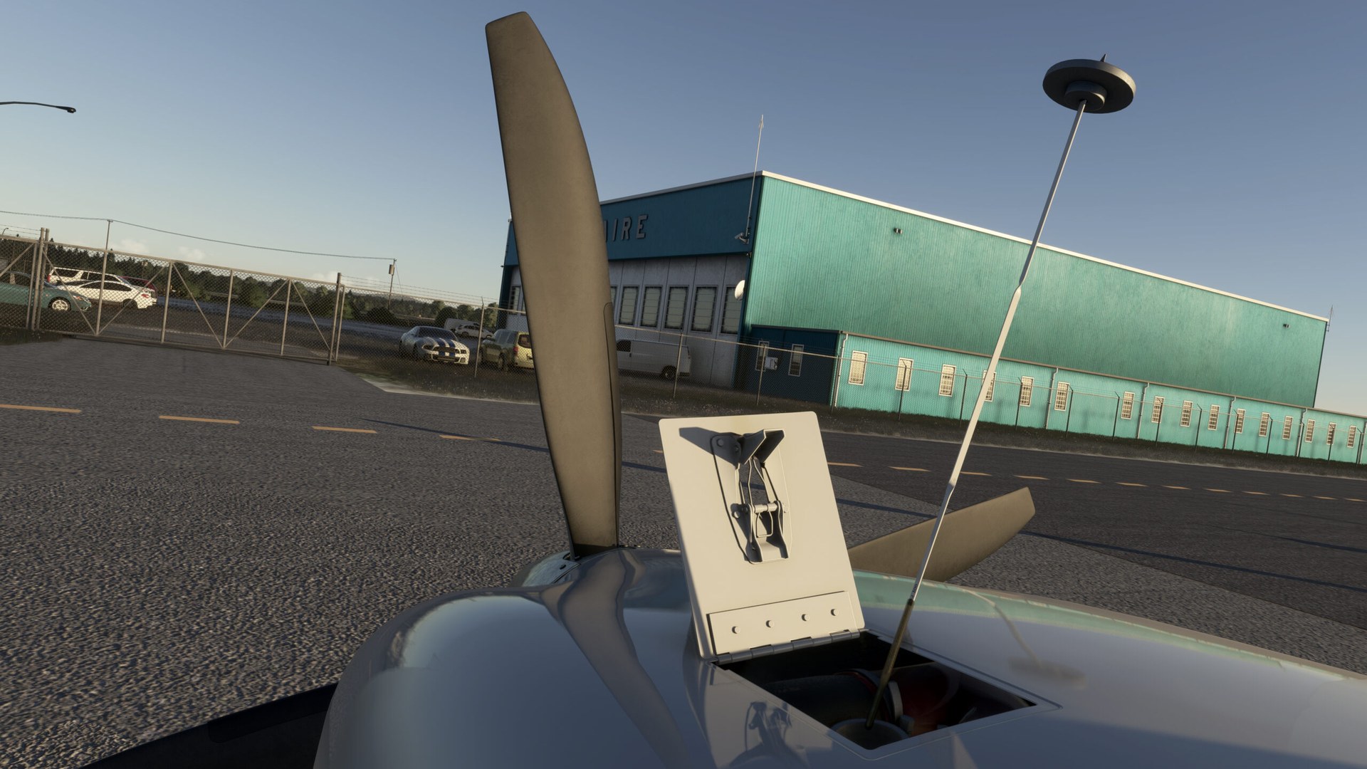 Close-up of a Legacy RG550's propeller blade and an open inspection panel on the cowling