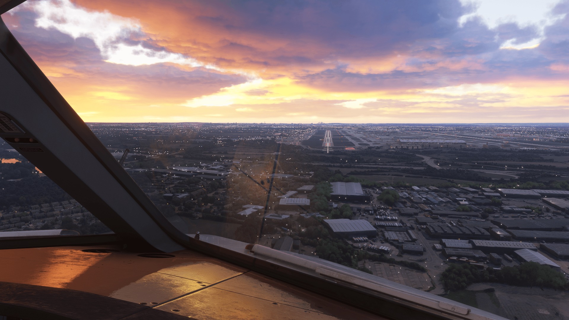 View from an airliner flight deck on approach over a city at sunset in Microsoft Flight Simulator 2024.