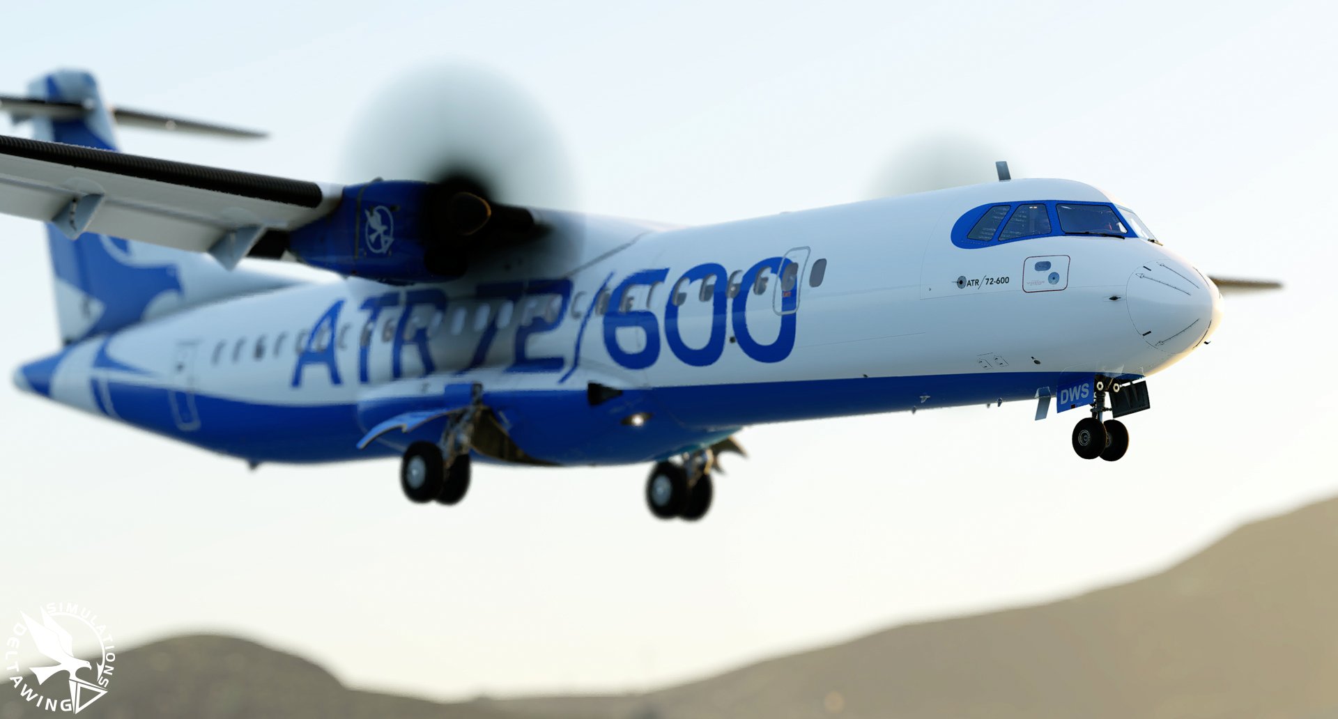 A blue and white ATR 72-600 with its landing gear down, flying low over hills in X-Plane 12
