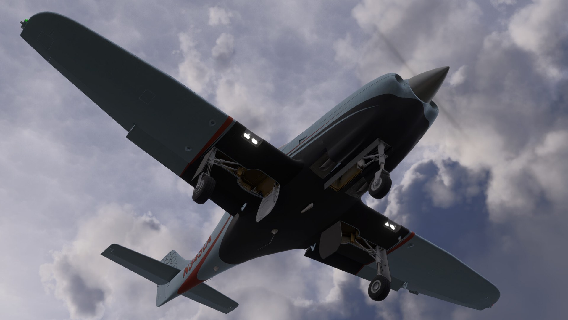 The Legacy RG550 seen from below as it flies overhead with its landing gear down, against a cloudy sky