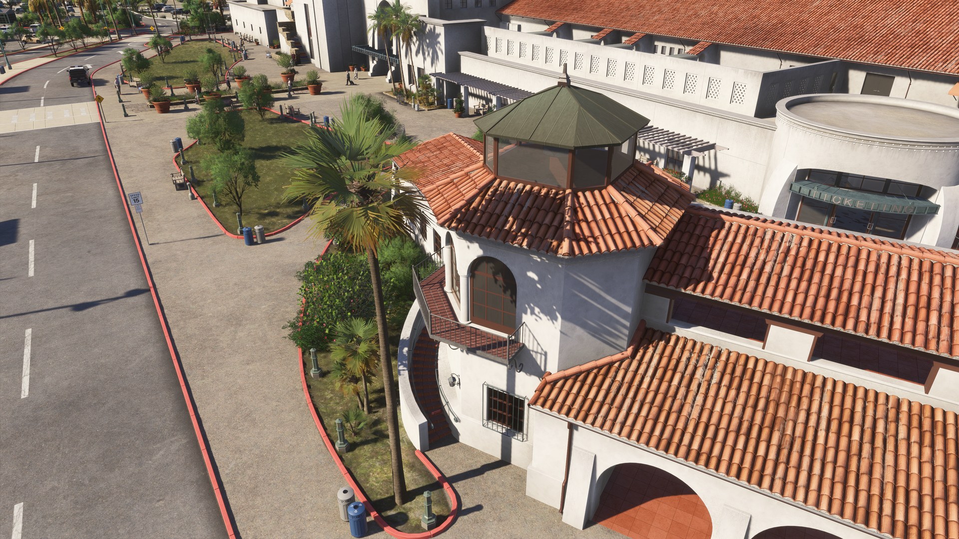 Red-tiled terminal roofs and a courtyard seen from above