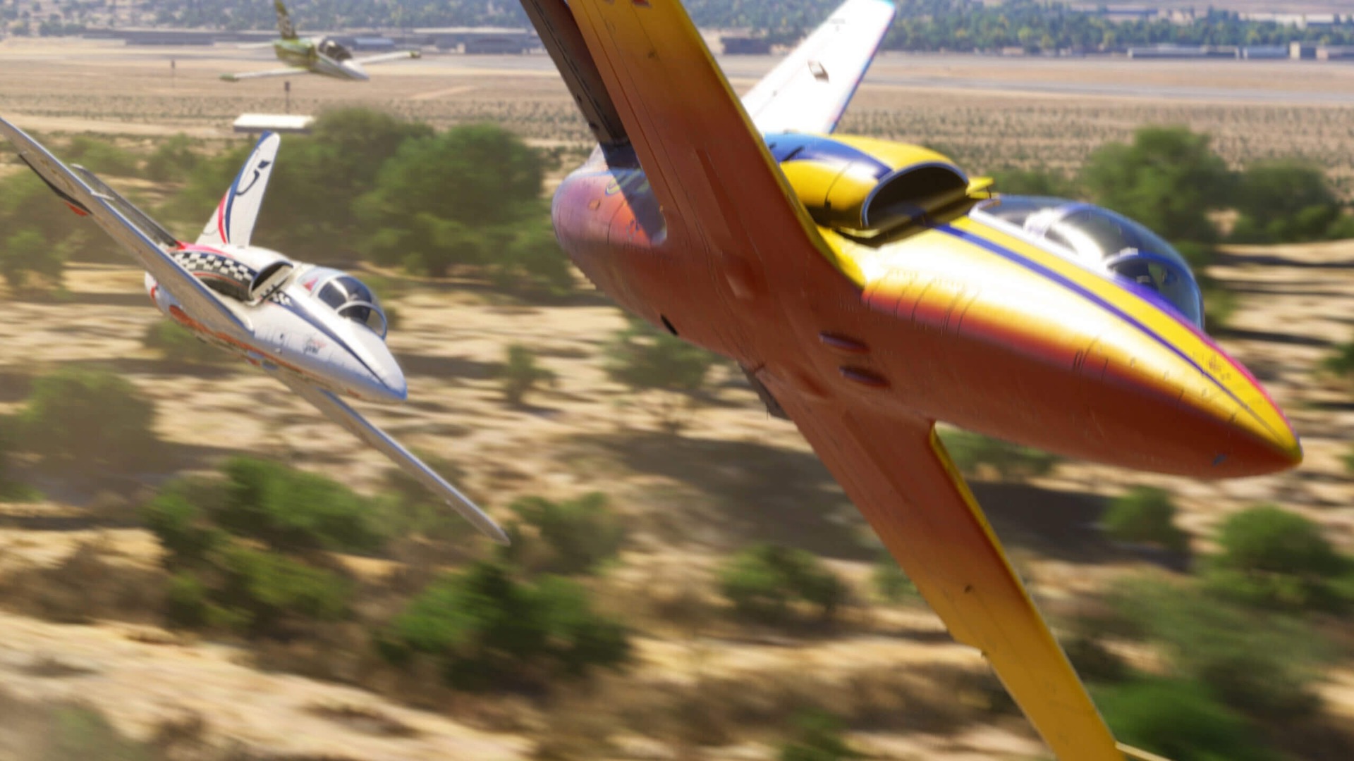 Two race planes, one yellow and one white, banking low over desert scrub in Microsoft Flight Simulator 2024 air racing.